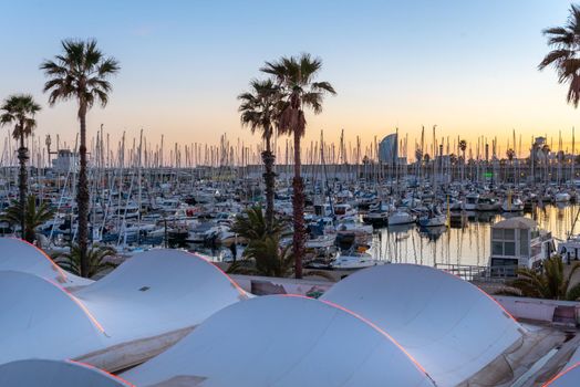 Barcelona, Spain - Febrary, 2021 - Port Olympic in the Barceloneta area on the Mediterranean. -