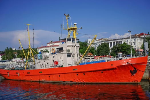 Sevastopol, Russia. Seascape with a ship in the Bay against the blue sky on a Sunny summer day.