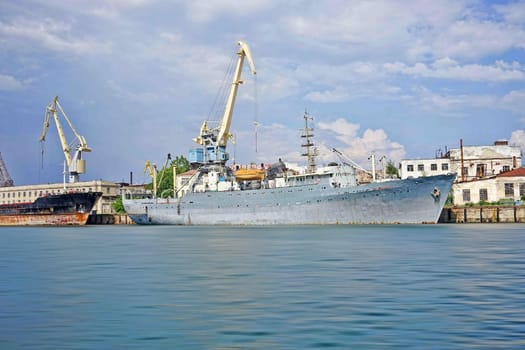 Sevastopol, Russia. Seascape with a ship in the Bay against the blue sky on a Sunny summer day.