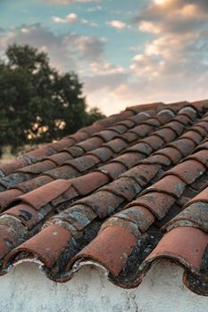 roof of a Farm in the middle of the countryside of the Sierra of Cordoba Andalusia at sunset