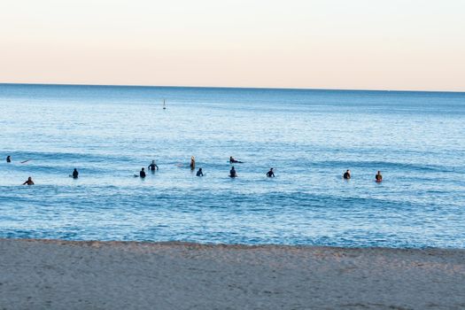 Barcelona, Spain: 2021 February 12: People walk along the Barcelona promenade in time of Covid 19 in winter 2021.