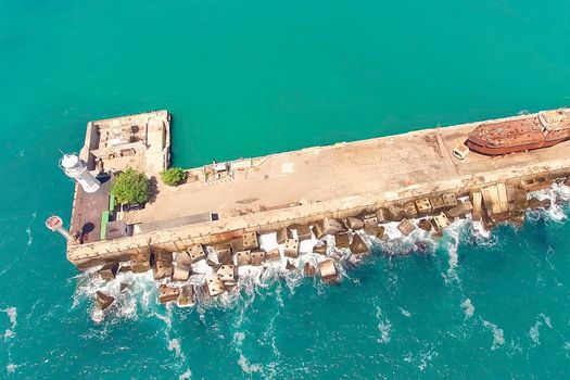 Aerial view of the sea landscape with a view of the lighthouse. Yalta, Crimea