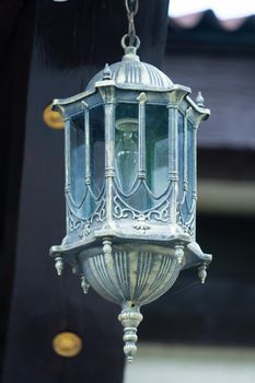 Vintage lamp on a dark background.