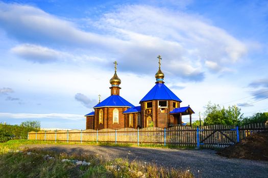 Murmansk, Russia-June 5, 2015: wooden chapel with a blue roof on the shore of the Kola Bay.