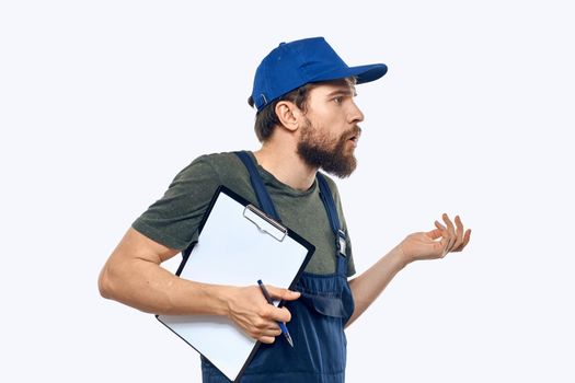 Man worker in uniform providing loading delivery service. High quality photo