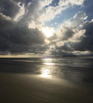 Sunset at the beach during low tide