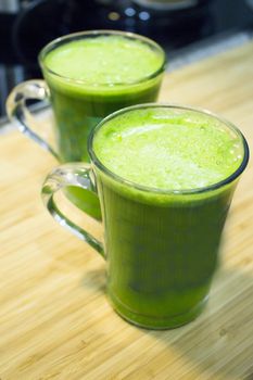 Green celery juice detoxifying drink. Vegan drink