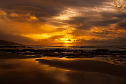 once in a life time beautiful sunrise over the indian ocean, waves are breaking at the great ocean road, victoria