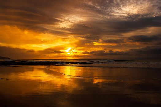 once in a life time beautiful sunrise over the indian ocean, waves are breaking at the great ocean road, victoria