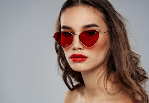 Elegant woman in sunglasses brunette cropped view. High quality photo