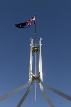 australia flag on the Parliament House in Canberra