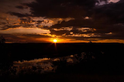 shot of a beautiful sunset in the australian outback with 1 lakes, Nitmiluk National Park