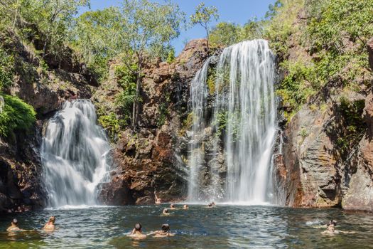 Litchfield National Park, Northern Territory, Australia - Jun 12 2013: Tourists and residents of Darwin enjoy refreshing swim at Florence Falls, very popular desitination for tourists and locals alike