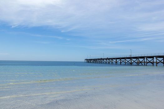 wooden jetty on an western australian beach, australia