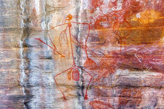 Ancient Aboriginal Art: hand prints, animal herds, spiral in a cave, Kakadu National park, australia