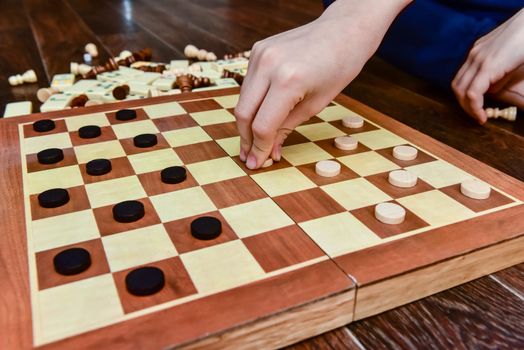 checkers chess dominoes and backgammon games at home with your family. set of board games.