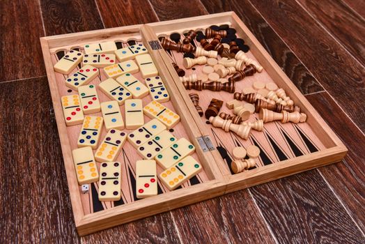 checkers, chess, dominoes and backgammon. set of board games