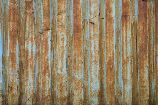 Texture painted rusted metal, colored background with iron fence. grunge green-yellow old dirty abstract Background.