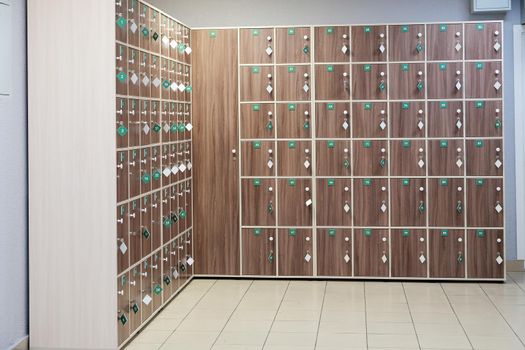 lockers with numbers in fitness center. gym storage system.