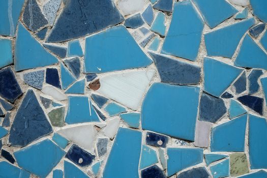 Colorful ceramic mosaic floor or wall. mosaic top view. Bathroom or kitchen floor wall design idea. Reused broken tile. Interior design. Colored eastern pottery.