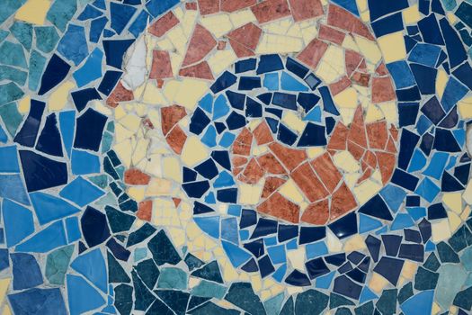 Colorful ceramic mosaic floor or wall. mosaic top view. Bathroom or kitchen floor wall design idea. Reused broken tile. Interior design. Colored eastern pottery.