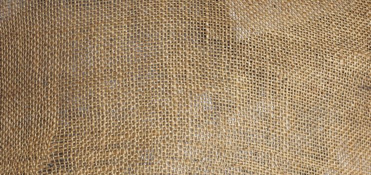 brown burlap hessian texture useful as a background