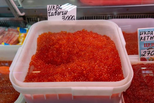 Petropavlovsk-Kamchatsky, Russia-October 6, 2019: red caviar on display at the seafood market.