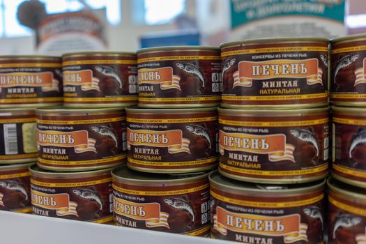 Petropavlovsk-Kamchatsky, Russia-October 6, 2019: canned Fish in the seafood market showcase.
