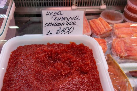 Petropavlovsk-Kamchatsky, Russia-October 6, 2019: red caviar on display at the seafood market.