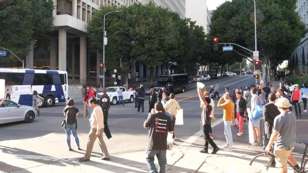 LOS ANGELES, CALIFORNIA, USA - 30 OCT 2019: People strike near Hall of Justice. Protest picket in front of Sheriff's Department and Courthouse. Demonstration of activists near LA government building.