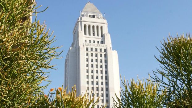 LOS ANGELES, CALIFORNIA, USA - 30 OCT 2019: City Hall highrise building exterior in Grand Park. Mayor's office in downtown. Municipal civic center, federal authority, headquarters of government in LA.