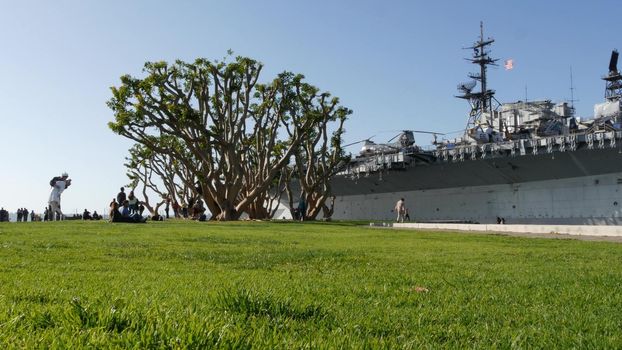 SAN DIEGO, CALIFORNIA USA - 23 FEB 2020: Unconditional Surrender Statue, USS Midway Museum. Symbol of navy fleet and Victory over Japan Day. Sailor kissing a woman, World War II memorial sculpture.