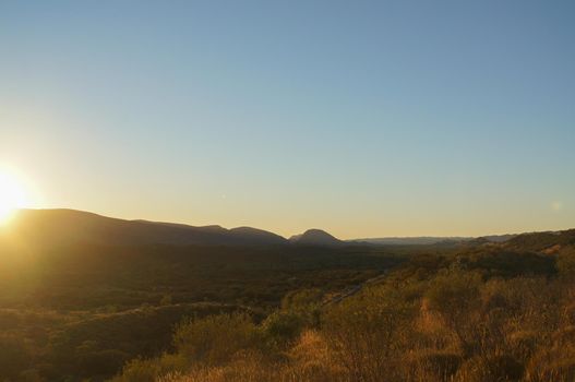 Hiker at the top of Mount Gillen just outside Alice Springs in central Australia.