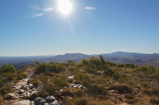 Hiker at the top of Mount Gillen just outside Alice Springs in central Australia.