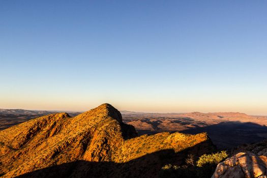 Hiker at the top of Mount Gillen just outside Alice Springs in central Australia.