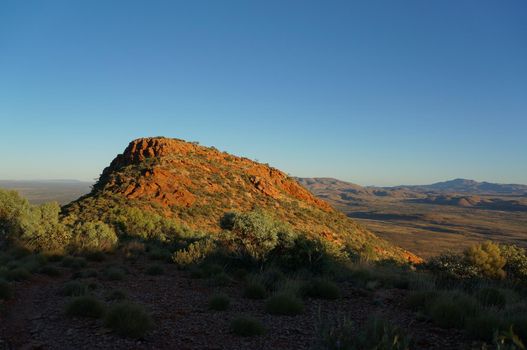 Hiker at the top of Mount Gillen just outside Alice Springs in central Australia.