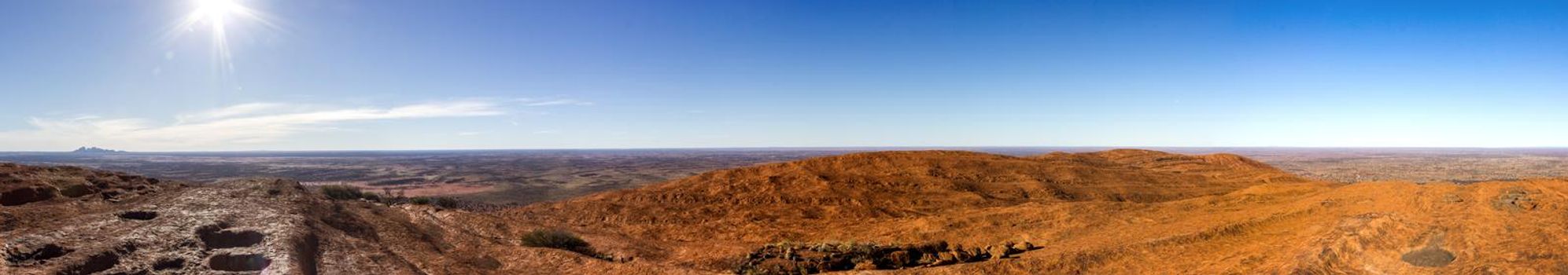 panorama of the view from the uluru after hiking up the Uluru, ayers Rock, the Red Center of Australia