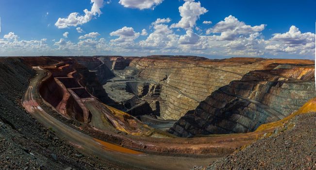 the biggest australian gold mine - super pit in Kalgoorlie, Western Australia, on a sunny summer day.