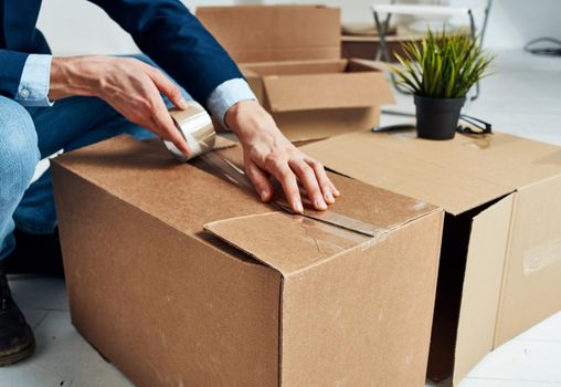 Packing boxes collecting things office work of a professional. High quality photo