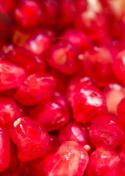 Closeup image of full frame background of Pomegranate seeds as fruit background