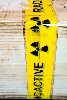 Radioactive material warning sign at the transportation paper package