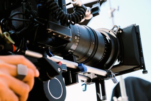 Film industry. Filming with professional camera background