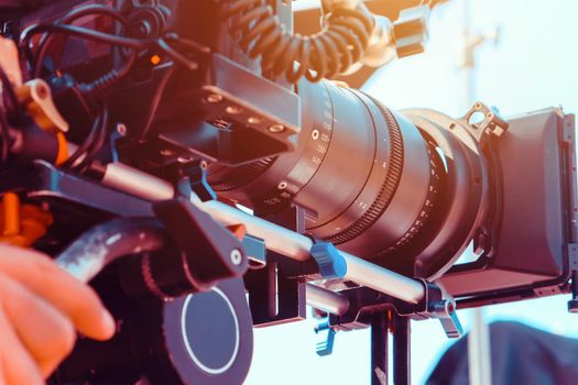 Film industry. Filming with professional camera background