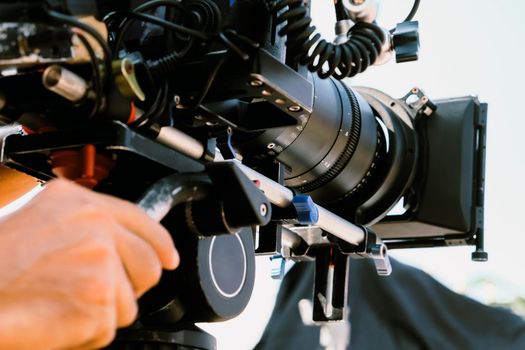 Film industry. Filming with professional camera background
