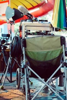 Film crew equipment, Detail image of  director's chair on a film set.