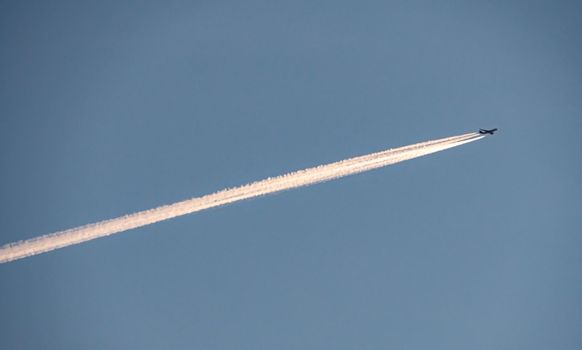 Jet of airplane line at the sky