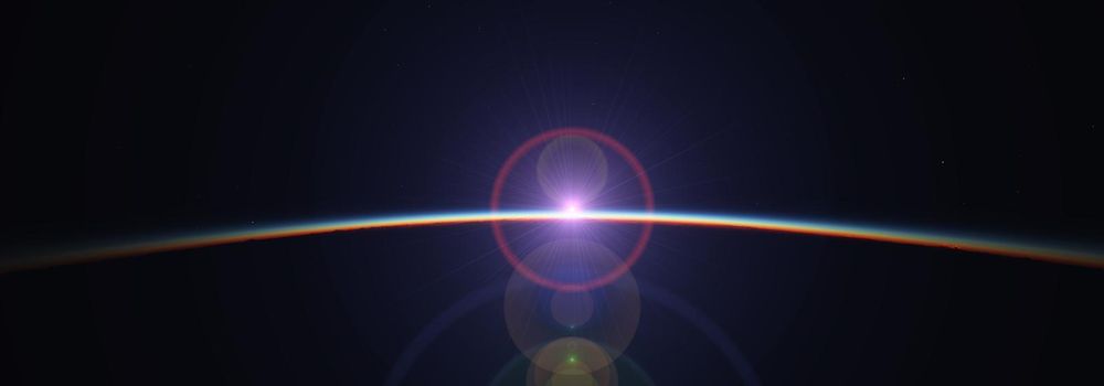 Earth sunrise from space over cloudy ocean. 3d rendering illustration