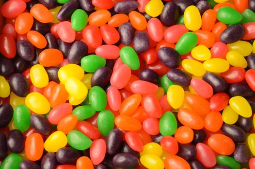 A full horizontal frame of many various jelly bean candy to create a sweet background.