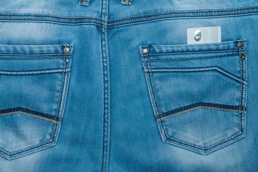 bank card in the back pocket of your pants. High quality photo
