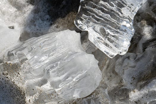 Natural background with chunks of shiny sea ice